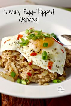 savory egg - topped oatmeal on top of rice in a white bowl