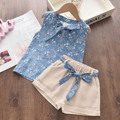 Brand Name: deanwangktAge Range: 25-36mAge Range: 4-6yAge Range: 7-12yStyle: CasualOrigin: CN(Origin)CN: ZhejiangSeason: SummerMaterial: CottonMaterial: Faux LeatherMaterial: Stretch & SpandexGender: GirlsItem Type: SetsDepartment Name: ChildrenCollar: O-NeckClosure Type: PulloverSleeve Style: RegularPattern Type: SolidModel Number: AZ2305-CSleeve Length(cm): SleevelessFit: Fits true to size, take your normal sizeOuterwear Type: ShortsFabric Type: Worsted Floral Chiffon Top, Print Outerwear, Bow Shorts, Chiffon Floral, Design Girl, Embroidered Shorts, Summer Prints, Girls Clothing Sets