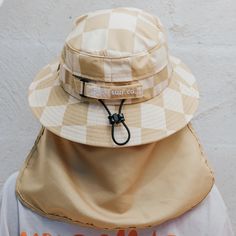 Beach Beige, for the not so beige beach babes. We want a surf hat that says “I’m more than Beige” and here it is.Checkered Beige Bucket hat in our classic design. Colour: Beige Checkers Beige Bucket Hat, Surf Hat, Beige Beach, Surf Hats, Bucket Hat Design, Surf Wear, Colour Beige, Reduce Waste, Beach Babe