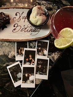 several polaroid photos are sitting on a table next to a plate with a slice of cake