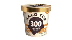 halo top 500 calories ice cream in a gold foil container on a white background