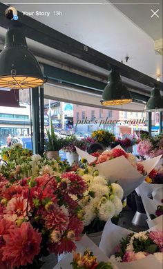 a bunch of flowers that are sitting on a table