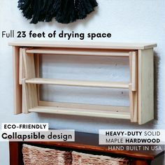 the shelf is made out of wood and has two shelves on it with different types of items