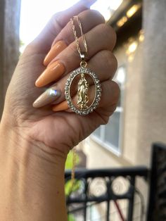 Fast and Free shipping from USA! Beautiful ornate Virgin Mary necklace perfect to enjoy for yourself or to give to a friend or loved one as a gift! Spiritual Our Lady Of Guadalupe Jewelry Gift, Virgin Mary Pendant Jewelry As A Gift, Virgin Mary Pendant Necklace As Gift, Oval Our Lady Of Guadalupe Necklace For Gift, Virgin Mary Pendant Jewelry Gift, Oval Our Lady Of Guadalupe Necklace Gift, Our Lady Of Guadalupe Round Pendant As Gift, Oval Virgin Mary Jewelry Gift, Gold Our Lady Of Guadalupe Necklace Gift