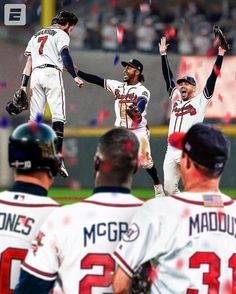 the baseball players are celebrating on the field