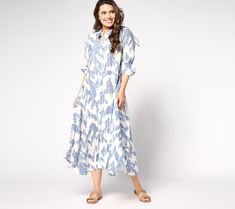 Slip into this billowy button-front dress and strike a supermodel pose. Then strut through the streets like you just stepped off the runway and watch as heads turn in your direction. From Peace Love World. Blue Long Sleeve Maxi Dress With Abstract Print, Spring Blue Ikat Print Dress, Blue Cotton Maxi Dress With 3/4 Sleeves, Long Sleeve Ikat Print Beach Dress, Non-stretch Blue Floral Print Dress, Button Front Dress, Peace Love, The Streets, Sleeve Dress