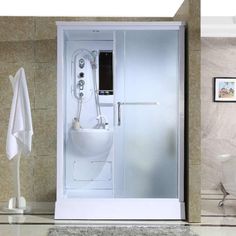 a bathroom with a shower, toilet and bathtub in the corner next to a rug