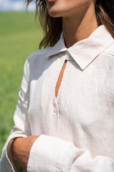 Top with extended sleeves buttoned down the front and a straight silhouette. This elegant top features extended sleeves and a classic button-down front. With its straight silhouette, it offers a timeless and versatile look that can be dressed up or down for any occasion. STYLE DETAILS * Regular fit * Extended sleeves * Buttoned down the front * Made from 150g linen SIZES & COLORS IN THE PICTURES * Model wears size S in color of white linen. She is 176 cm (5'9"). Bust - 83 cm (33"), waist - 60 cm (24"), hips - 89 cm (35"). NOTES ON SIZING & COLORS Please note that sizes may vary by 1-2 cm. The product's color may also differ slightly due to varying screen settings. FABRIC & CARE * Linen fabrics are woven in Lithuania * Machine wash in 40o (104F) * All linen fabrics have already been washed Blouse With Buttons And Fold Down Collar, Relaxed Fit Blouse With Button Closure And Collar, Spring Collared Blouse With Placket, Linen Long Sleeve Top With Button Closure, Long Sleeve Linen Top With Button Closure, Collared Blouse With Hidden Button Closure For Daywear, Spring Blouse With Placket And Fold Down Collar, Beige Button-up Top With Placket, Classic Summer Blouse With Fold Down Collar