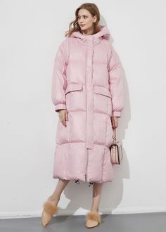 Stay warm and cozy in style this winter with this thick, hooded, pink women's puffer jacket. Fluff yourself up and stay fabulously fashionable - no matter how cold it gets! Fixed hood Lined, with 90% 600-fill-power down, 10% feather fill Polyester Front zip closure with snap storm flap Elastic cuffs Women's winter coat Machine wash, tumble dry Item #310241 Size info XS=US2=UK6=EU32 S=US4-6=UK8-10=EU34-36 M=US8-10=UK12-14=EU38-40 L=US12=UK16=EU42 ★★ It would be helpful if you provided your height Women's Winter Coat, Women's Puffer Coats, Long Puffer, Down Puffer Coat, Puffer Jacket Women, Pink M, Down Feather, Winter Coats Women, Down Coat