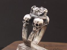 MySacrum  SKULL RING ENGAGEMENT by MySacrum on Etsy https://www.etsy.com/listing/239604635/mysacrum-skull-ring-engagement Etsy Engagement Rings, Skull Wedding Ring, Skull Engagement Ring, Garnet Engagement Ring, Skull Wedding, Black Engagement Ring, Engagement Ring Photos, Biker Rings, Skull Jewelry