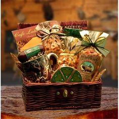 a basket filled with lots of different types of food and snacks on top of a table