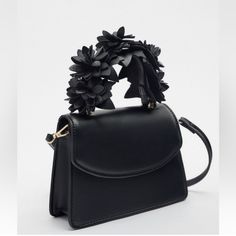 Zara Has Done It Again, Designer Fare At Such Reasonable Prices. This One Is A Rare Find. Originally Priced At $89.99 I Am Selling For A Low Price Of $49. Lowest Selling Price On Internet. Selling Elsewhere On Poshmark For $69. It’s So Cute, And Such An Adorable Little Handbag. Get It Now. Happy Poshing Spring Black Leather Bags, Black Satchel With Detachable Strap For Spring, Trendy Black Zara Bag, Trendy Black Zara Shoulder Bag, Spring Black Shoulder Bag With Double Handle, Spring Party Top Handle Satchel, Spring Black Double Handle Shoulder Bag, Elegant Black Shoulder Bag For Spring, Black Bag With Detachable Strap For Spring