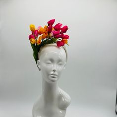 Handmade by Featured Milliner of The Kentucky Derby Museum 2023 & 2024! Spring has sprung! This is the perfect spring piece! Beautiful red, yellow and pink tulips with pops of green.  Attaches with headband.  Not taking customs this year--Derby 150 is going to be massive and mom life keeps me running! However, happy to suggest pieces that will coordinate with your outfit. If you don't love the way this attaches to your head--message me!  I can swtich *most* pieces to your preference. Clip, Headb Spring Multicolor Mini Hat With Curved Brim, Multicolor Spring Headband, Multicolor Headband For Spring, Red Fascinator For Spring Garden Party, Yellow Spring Headband, Spring Multicolor Hat Fascinator, Spring Garden Party Fascinator With Structured Crown, Spring Multicolor Fascinator, Multicolor Mini Hat Headband For Spring