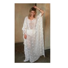 The Romantic Mykonos Kaftan is perfect for your next day by the oceanside. The semi-sheer touch is perfect to throw over a bathing suit. Whether you are spending a day by the pool or elevating this dress with a bag and heels, you will always be looking chic. Semi Sheer One Size Fits All Length measures 53" inches from shoulder to bottom hem 100% Cotton Chic Tunic Cover-up For Beach Season, Airy Flowy Dress For Beach Cover-up, Long Beachwear Swimwear As Beach Cover-up, Bohemian Sheer V-neck Cover-up, Long Flowy Cover-up For Vacation, Flowy Long Cover-up For Vacation, White Sheer Beachwear Cover-up, White Flowy Cover-up For Vacation, White Breezy Cover-up For Poolside