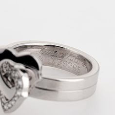 This is part of Chairish’s Fine Jewelry assortment.  Pre-owned Cartier double heart diamond ring crafted in 18k white gold (circa early 2000s).    Diamonds total an estimated 0.15 carats (estimated at G-H color and VS1-2 clarity).   The sweet double heart design is set with diamonds to one of the hearts. The ring is a smaller size (EU 47 or US 4) and is great worn on the pinky finger. Dating to the early 2000s the ring is an out of production Cartier design. The ring does not come with Cartier p Elegant Polished Heart Cut Ring, Luxury Heart Ring With Round Cut For Formal Occasions, Luxury Heart Cut Ring With Polished Finish, Elegant Formal Heart Ring With Brilliant Cut, Luxury White Gold Heart Ring For Wedding, Formal Fine Jewelry Heart Ring With Polished Finish, Formal Silver Diamond Heart Ring, Elegant Heart Ring With Polished Finish For Formal Occasions, Elegant Heart Ring With Polished Finish For Anniversary