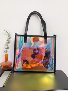 Bag For Love - Clear Holographic Shoulder Tote Bag - Women Tote Bags Product Description Color Multicolor Quantity 1 piece Type Shoulder Tote Bag Material PVC Composition 100% Polyvinyl Chloride Size Chart INCH CM Size Bag Width Bag Height Bag Length one-size 1.6/3.5 7.9/11 7.9/13 Size Bag Width Bag Height Bag Length one-size 4/9 20/28 20/33 Similar Products h2 { text-align: center; } .red-box { width: 100%; display: flex; flex-direction: row; flex-wrap: wrap; justify-content: center; } .red-box Trendy Multicolor Portable Bag, Trendy Square Bag With Letter Print, Trendy White Plastic Bags, Trendy Plastic Tote Shoulder Bag, Trendy Colorful Shoulder Bag For Shopping, Trendy Colorful Shopping Bag, Colorful Large Capacity Shoulder Bag, Trendy Colorful Tote Bag, Multicolor Portable Bag For Daily Use