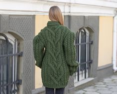 "MATERIAL : 2 strands of 100 % soft wool COLOUR : Green ( There may be a slight difference because of the different monitors' representation) ♥ In the picture the model is wearing a garment with these measurements : A: ( Body lenght) : 28.3 \" / 72 cm B: ( Chest width) : 21.3 \" / 54 cm C: (Sleeve from under the arm) : 22.8 \" / 58 cm D: (Neck unrolled) : 3.5 \" / 9 cm. They are taken with the item laid flat and not streched. ♥ For choosing your size please look at size chart in our listing pict Cozy Merino Wool V-neck Sweater For Winter, Wool V-neck Long Sleeve Sweater For Winter, Fall Wool V-neck Knitted Sweater, Cozy Wool V-neck Winter Sweater, Cozy Wool V-neck Sweater For Winter, Green Wool Long Sleeve Sweater, Green V-neck Sweater Coat For Winter, Green Merino Wool Long Sleeve Outerwear, Green Long Sleeve Merino Wool Outerwear