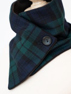 Known the world over, Black Watch tartan is extremely popular. So why not cuddle up in our Black Watch Tartan neck warmer? The greens and blues are classic and display a touch of Scottish pride. Unlike a traditional scarf, this neck warmer stays in place, and there's no bulk and no snagging. Stay warm and cuddle up in the classic; Black Watch. Made of 100% wool exterior, lined with luxe fleece, secured with a button. - Exterior made of Scottish wool - Lined with lux fleece - Handstitched in Alas Green Scarves For Winter Gifts, Green Winter Scarves For Gifts, Green Winter Scarf For Gift, Neck Warmer Pattern Sewing, Black Watch Tartan Christmas, Black Watch Plaid Christmas, Black Watch Plaid, Scottish Pride, Tartan Accessories