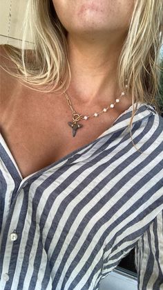 Our Half Pearl Shark Tooth Toggle Necklace features a 18K gold plated stainless steel paperclip chain and clasp, freshwater pearls, and a fossilized shark tooth. Whether you're dressing up or keeping it casual, this unique necklace is your go-to for adding a splash of coastal charm to any outfit.   Note: Every shark tooth is unique therefore size, color and shape will vary! Please be aware you will most likely NOT receive the exact tooth pictured, but you will receive one similar! If you have any questions or would like to see the exact teeth we have available please contact us before placing your order! Brandy Fits, Teeth Pictures, Gifts Forbest Friend, Ocean Inspired Jewelry, Shark Tooth Necklace, Tooth Necklace, Toggle Necklace, Shark Tooth, Shark Teeth