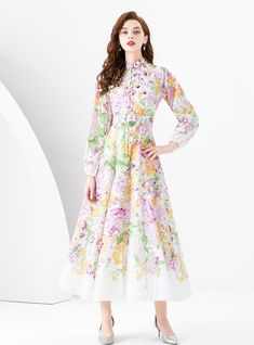 "Bloom into elegance with this pastel-hued masterpiece, a dress that intertwines the gentleness of a spring garden with the grace of high fashion. Boasting an ethereal array of floral designs, this piece is a sartorial tribute to the tender beauty of nature. Its full-length sleeves and high mandarin collar lend a vintage touch, while the fitted waist—highlighted by a delicate belt—creates a flattering silhouette. Crafted from a lightweight, flowing fabric, the dress moves with a dreamlike quality. The soft palette of pinks, greens, and lilacs paints a picture of serene loveliness, perfect for garden parties, springtime weddings, or simply when one wishes to carry the freshness of spring wherever they go." Fabric name: chiffonPattern: printingSkirt length: long skirtSkirt type: flounce skir Elegant A-line Floral Dress For Spring, Pink A-line Maxi Dress For Spring, Feminine Spring Maxi Dress For Garden Party, Feminine Maxi Dress For Garden Party In Spring, Long Sleeve Midi Dress For Spring Garden Party, Spring Pastoral Long Sleeve Dresses, Pastoral Long Sleeve Dresses For Spring, Pastoral Long Sleeve Spring Dresses, Spring A-line Midi Dress For Garden Party