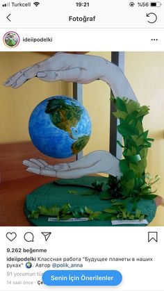 an image of someone holding the earth in their hands on facebook page with caption below