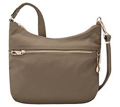 Enjoy extra piece of mind when it comes to your personal information, along with plenty of pockets for organized travel--whether it's across town or across the country--with this spacious hobo bag. From Travelon. Versatile Hobo Bag With Cell Phone Pocket For Travel, Travel Hobo Bag With Cell Phone Pocket, Crossbody Style, Travel Crossbody Hobo Bag With Cell Phone Pocket, Hobo Bag With Zipper Pocket For Travel, Hobo Travel Bag With Zipper Pocket, Functional Hobo Bag With Zipper For Travel, Travel Hobo Bag With Zipper Pocket, Versatile Hobo Bucket Bag For Travel, Versatile Hobo Bag For Travel