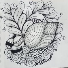 a drawing of a flower with swirls and leaves on it's side, in black and white