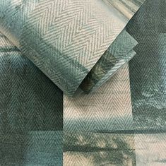 a close up view of the fabric on a bed