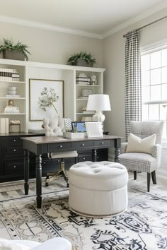 a living room filled with furniture and lots of shelves on top of each other in front of a window