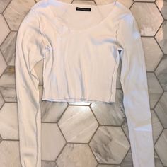 Cute And Simple Long Sleeve That Is A Closet Staple. It’s A Crop Top So Perfect For The Summer! It’s A One Size Fits All And Is Super Stretchy. Never Worn! I Have Dogs, So If You Have A Dog Allergy Please Don’t Buy Dog Allergy, Dog Allergies, Closet Staples, Brandy Melville Tops, White Long Sleeve, White Tops, Brandy Melville, One Size Fits All, A Dog