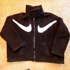 Never Worn - No Tags Nike Sportswear Double Swoosh Jacket Full Zip Black With White Swooshes Seriously Soft Hi-Loft Sherpa Fleece A Roomy Fit And Mesh Lining Help You Move Without Distraction And Layer Comfortably. Oversized Fit For A Baggy, Spacious Feel 100% Polyester Machine Washable Nike Black Casual Fleece Jacket, Nike Black Fleece Jacket For Streetwear, Nike Cozy Winter Outerwear, Oversized Fleece Outerwear For Sports, Black Casual Fleece Jacket For Winter Sports, Casual Black Fleece Jacket For Winter Sports, Nike Cozy Sports Outerwear, Cozy Nike Sports Outerwear, Cozy Black Outerwear For Streetwear