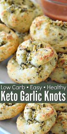 low carb and easy healthy keto garlic knots on a plate with dipping sauce