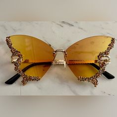 Butterfly Gold Tint Sunglasses Brand New Yellow Glass Sunglasses For Party, Yellow Sunglasses With Gradient Lenses For Party, Yellow Gradient Lens Sunglasses For Party, Yellow Gradient Lenses Sunglasses For Party, Casual Glass Cat Eye Sunglasses For Party, Casual Cat Eye Sunglasses For Party, Yellow Sunglasses For Summer Party, Yellow Summer Party Sunglasses, Party Clear Cat Eye Sunglasses With Mirrored Lenses