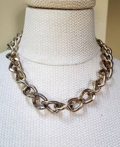 Vintage Adjustable Chain Link Choker/Bib Necklace. Has vintage wear. Vintage Metal Chain Necklace With Lobster Clasp, Costume Jewelry Chain Necklace With Chunky Chain Link, Chunky Chain Link Necklace In Costume Jewelry, Vintage Style Chunky Chain Necklace As Gift, Vintage Chunky Chain Necklace As Gift, Chunky Chain Link Necklace Costume Jewelry, Silver Chain Necklace With Oval Link And Gold Chain, Vintage Metal Chain Necklace With Adjustable Chain, Retro Metal Chain Necklaces