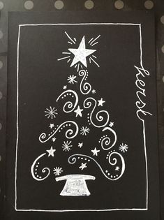 a chalk drawing of a christmas tree on a blackboard with white stars and swirls