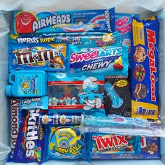 a box filled with lots of different types of candy