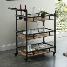 a wine rack with bottles and glasses on it