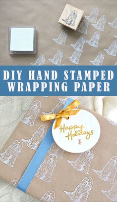 a hand stamped wrapping paper with blue ribbon and rubber stamping on it, next to a