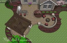 this is an aerial view of a house and its landscaping design, including the patio