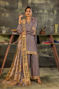 Brand: SAFWAProduct Code: MLO-03Collection: Melora by Safwa Printed Doria Viscose Unstitched CollectionFabric: Doria Viscose PRODUCT DETAILS: Digital Printed Viscose Doria Shirt 3.0 Mtr Digital Printed Doria Viscose Dupatta 2.5 Mtr Dyed Viscose Doria Trouser 2.5 Mtr DISCLAIMER:* Lining, Laces, and Tassels are not included in unstitched variants.* Embellishment items in stitched outfits are subject to market availability.* The actual colors of the outfit may vary from the colors being displayed o Fitted Gray Sets For Eid, Elegant Gray Sets With Zari Work, Gray Dupatta For Eid, Unstitched Gray Dupatta For Eid, Elegant Gray Designer Wear Sets, Designer Gray Set With Zari Work, Gray Eid Sets With Dupatta, Elegant Gray Sets For Eid, Traditional Gray Salwar Kameez With Dupatta