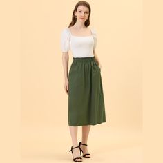 Remember the good times in this cotton A-line midi skirt.Simple and delicate, this skirt features elastic waist, slash pocket, solid color, cotton fabric, A-line, and midi length. From Monday to Sunday, this skirt is effortless to throw on. With the design of elastic waist, this skirt is easy to wear for all kinds of body shapes. Pair perfectly with a T-shirt or shirt for a stylish look. Cotton Midi Length Bottoms For Summer, Midi Skirt With Pockets For Daywear, Green Knee-length Cotton Skirt, Green Cotton Knee-length Skirt, Green Midi Skirt For Summer, Spring Maxi Skirt With Pockets For Daywear, Green Cotton Midi Skirt, Spring Cotton Maxi Skirt With Elastic Waistband, Casual Cotton Maxi Skirt For Daywear