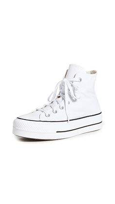 Find CONVERSE Chuck Taylor All Star Lift High Top Sneakers on Editorialist. Fabric: Canvas. Removable insole. Signature logo patch. Lace-up closure. Rounded toe. Rubber sole. Imported, Vietnam. This item cannot be gift-boxed. Measurements: Platform: 1.25in / 30mm White High-top Platform Sneakers With Rubber Sole, White Platform High-top Sneakers, Converse White Platform Sneakers, White Converse High-top Platform Sneakers, White Converse Platform High-top Sneakers, White Converse Platform Sneakers, Converse White Platform Sneakers With Speckled Midsole, Converse White Platform Sneakers With Branded Insole, White Converse Platform Sneakers With Branded Insole