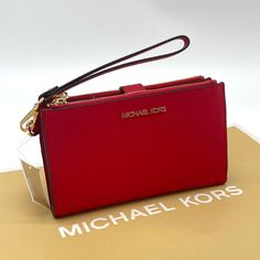 Brand New With Tag Michael Kors Jet Set Travel Double Zip Wristlet, Wallet, Clutch, 7-8 100% Genuine Saffiano Leather Color: Bright Red Gold Hardware 6 Credit Card Holders 1 Id Holder 2 Slip Compartments 2 Zip Pockets A Phone Holder Slot And A Large Bill Section Accessible From The Side 7.25" X 4.25" X 1" Comes With A Detachable Wrist Strap This Is An Outlet Style Leather Wristlet With Card Slots, Small Coin Pouch, Micheal Kors Wallet, Key Holder Wallet, Gold Wallet, Pink Wristlet, Card Case Wallet, Large Wallet, Black Wallet