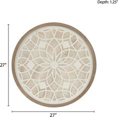 a white and brown wooden plate with an intricate design on the side, measurements for each piece