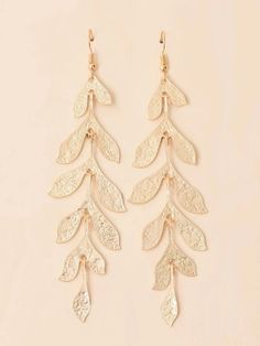 Bridal gold or silver tone extra long leaf tassel gold or silver multi link dangle earrings. Wedding jewelry dangle earrings. The earrings are also great for cosplays, such as Greek Goddess, Mid-century princess and queen, and pretty belly dancer. Versatile and chic, these earrings will be a stunning addition to a bridal outfit but also suitable for a more casual look. The ear wire can be substituted with a hypoallergenic S925 Gold plated ear wires. DIMENSIONS: 4.5"L x 1.2"WCLOSURE: Ear Wires, S Gold Leaf Decor, Pearl Bridesmaid Jewelry, Beach Jewelry Boho, Bridal Jewelry Necklace, Gold Bridal Earrings, Gold Leaf Earrings, Gold Statement Earrings, Crystal Accessories, Leaf Decor