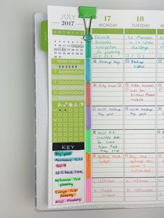 a planner is hanging on the wall