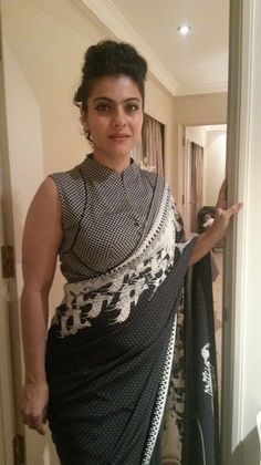 # Black Sarees  Check out Kajol in #saree White Sari, Blouse Designs High Neck, Cotton Blouse Design, Blouse Designs Catalogue, Saree Blouse Neck Designs, Sari Blouse Designs, Blouse Designs Indian, Salwar Kamiz, Blouse Designs Silk