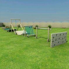 a set of wooden play equipment in the grass