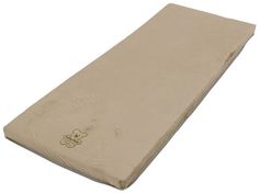 an image of a mattress that is not in use on the ground or bedding