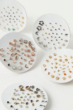 Set of 40 small delicate studs including 13 sets with shimmering stones and 7 sets with fun metal shapes. Easily mix and match to create your unique look. | Teeny Tiny Mega Stud Earring Set by Free People in Gold Small Earrings Gold, Colorful Stud Earrings, Polymer Clay Flower Jewelry, Cute Stud Earrings, Magnetic Earrings, Buy Earrings, Tiny Studs, Tiny Earrings, Tiny Stud Earrings